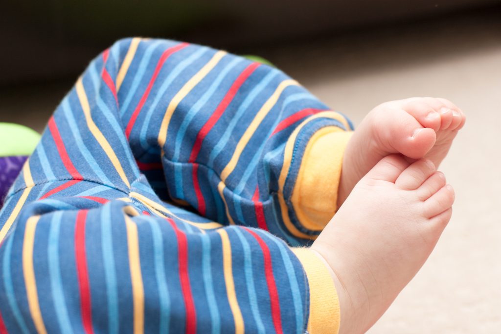 Baby Rubbing Feet Together