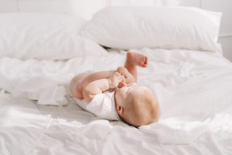 Baby Throwing Legs Up and Down in Sleep