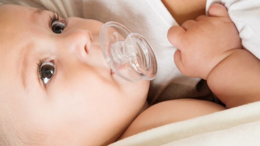 Baby Using Breast as Pacifier